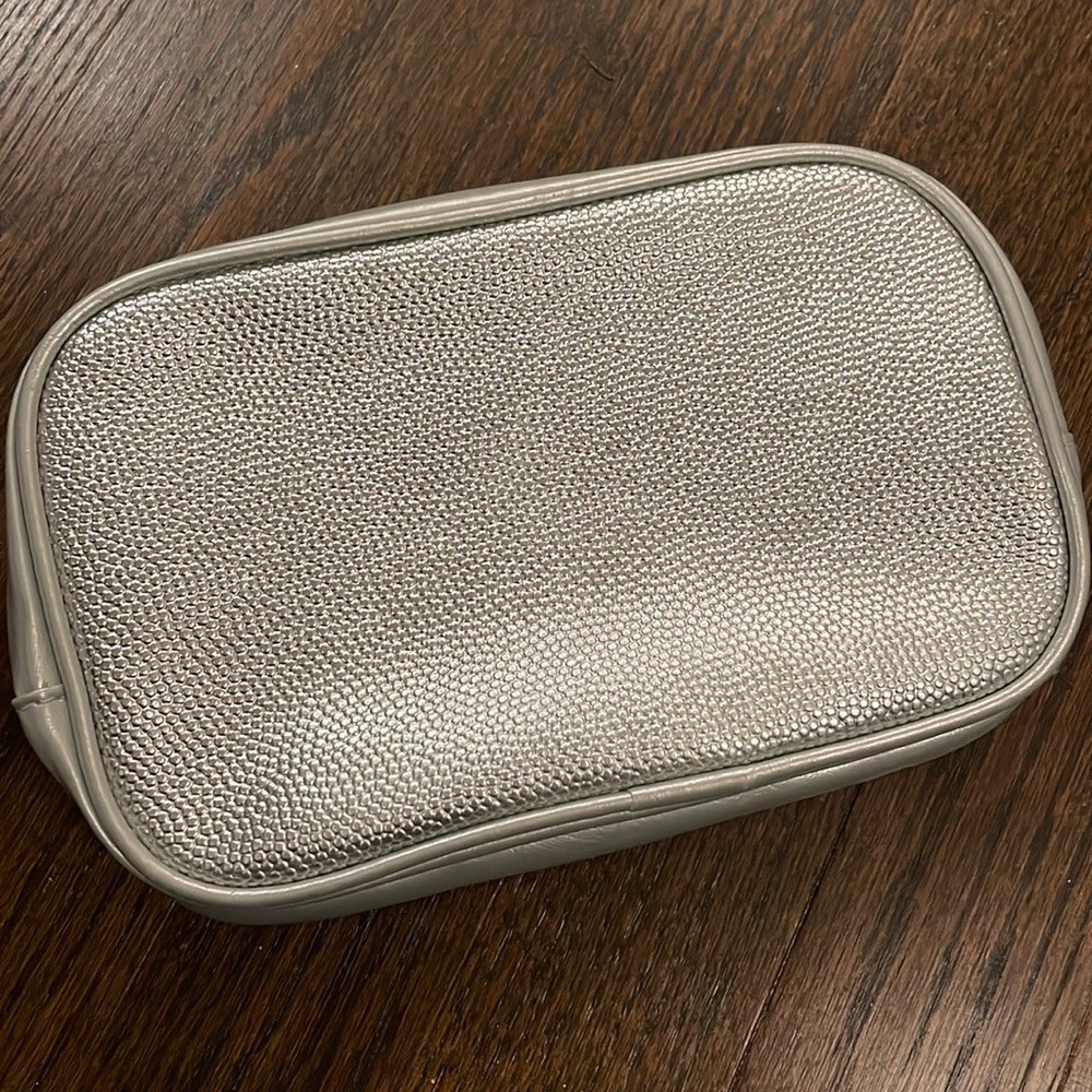 La Prairie silver Pouch.